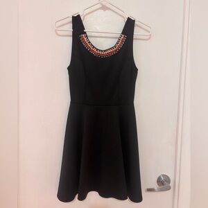 Elegant Black Dress with Beaded Neckline